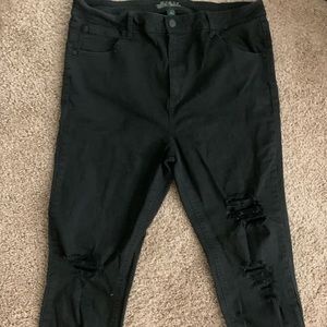 Black jeans with holes